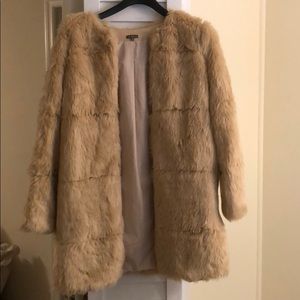 Cream faux fur coat. Size XS.